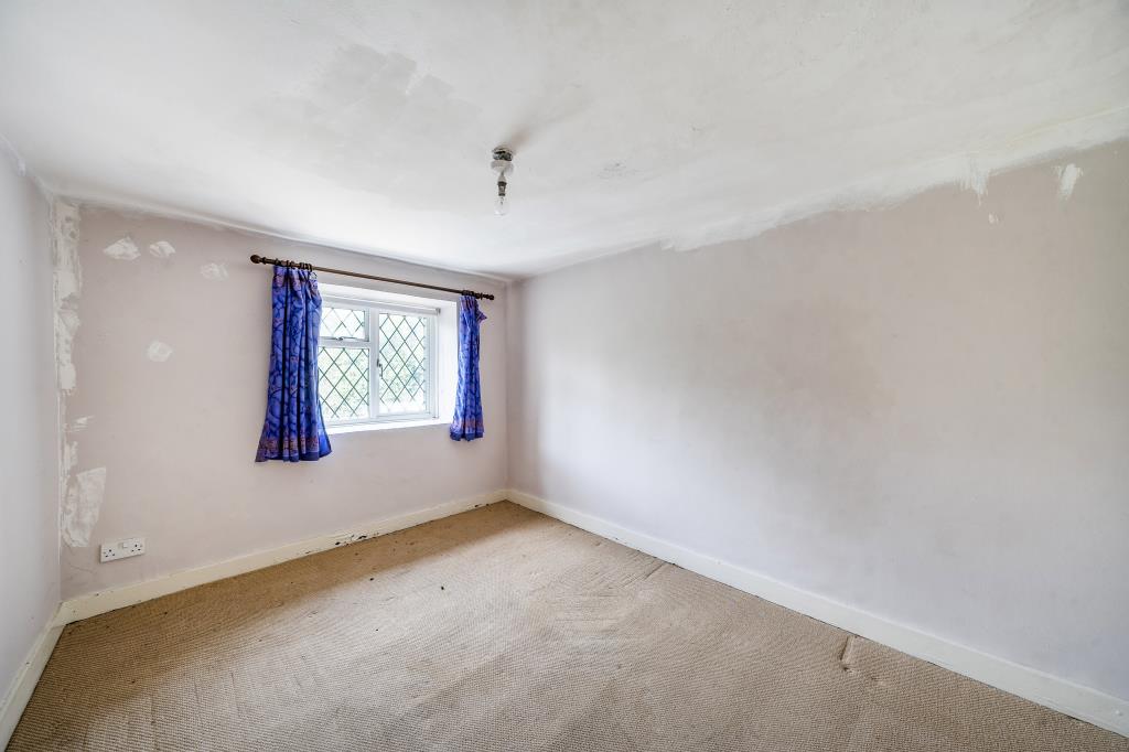 Lot: 156 - END-TERRACE COTTAGE FOR IMPROVEMENT - Bedroom with carpet and painted walls